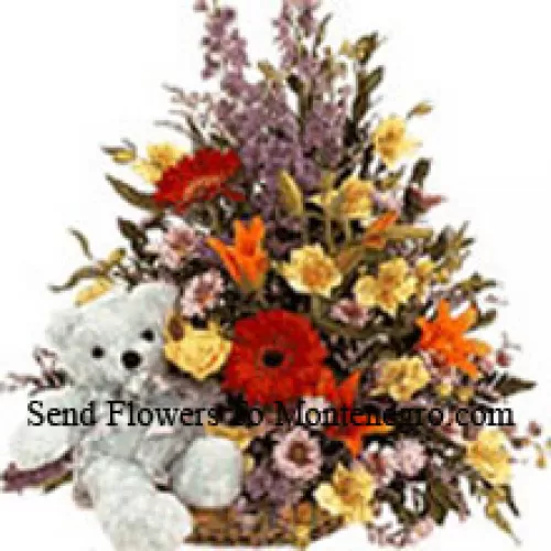 Basket Of Assorted Flowers With A Cute Teddy Bear